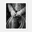 Black and white photograph of cowboy hands holding a coiled rope wearing denim, western ranch wall art.