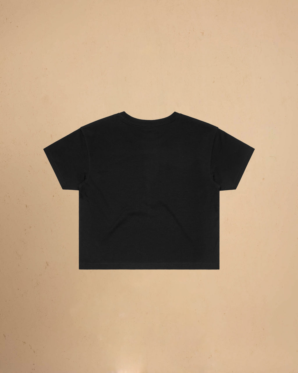 Black t-shirt on a beige background