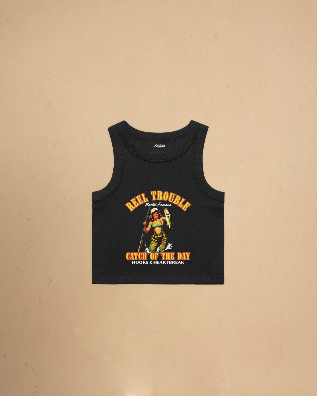 Women’s Reel Trouble organic crop tank featuring a vintage fishing pin-up graphic with retro western styling and heavyweight ribbed cotton construction.