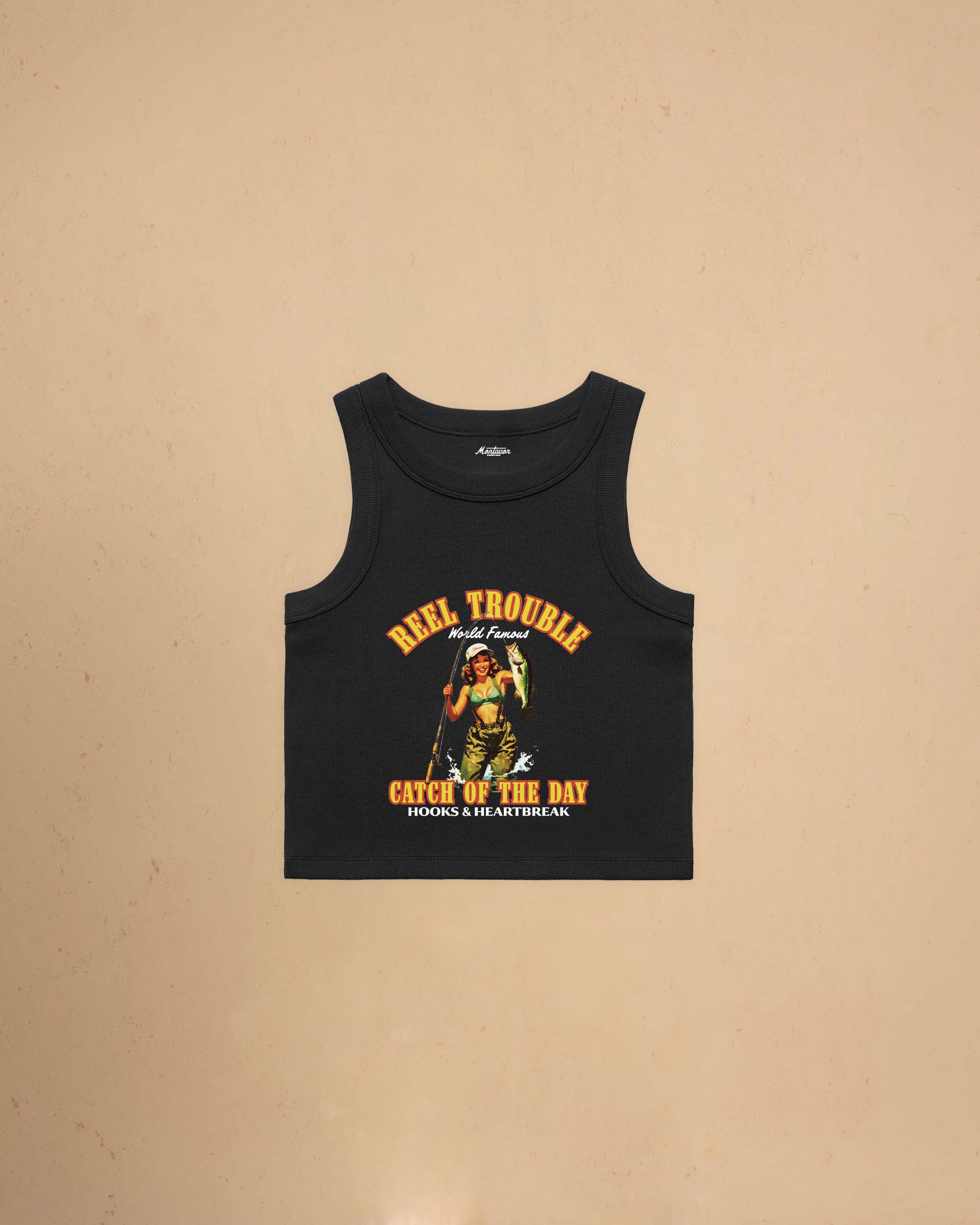 Women’s Reel Trouble organic crop tank featuring a vintage fishing pin-up graphic with retro western styling and heavyweight ribbed cotton construction.