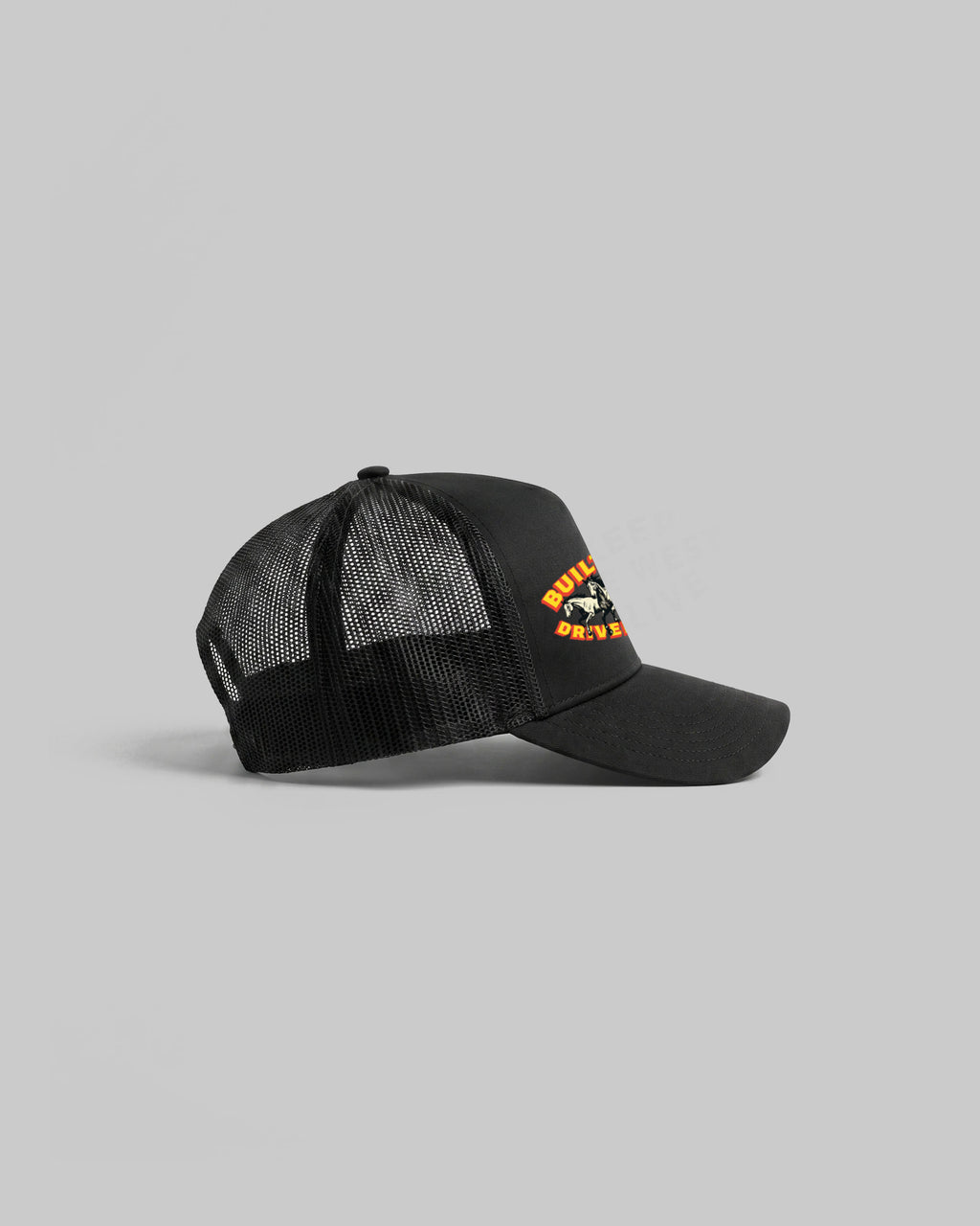 Black trucker cap with curved peak.