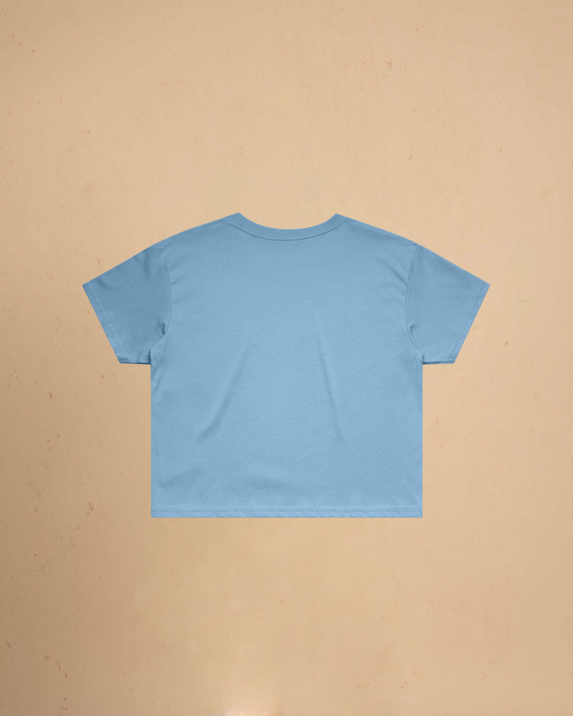 Light blue t-shirt on a beige background