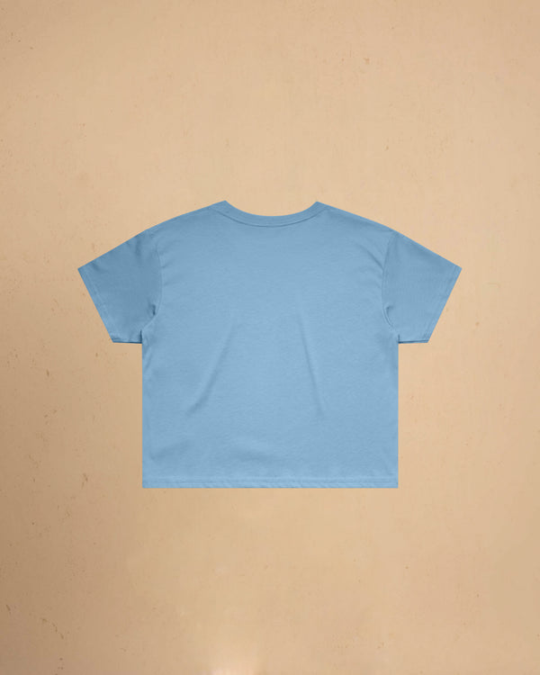 Light blue t-shirt on a beige background