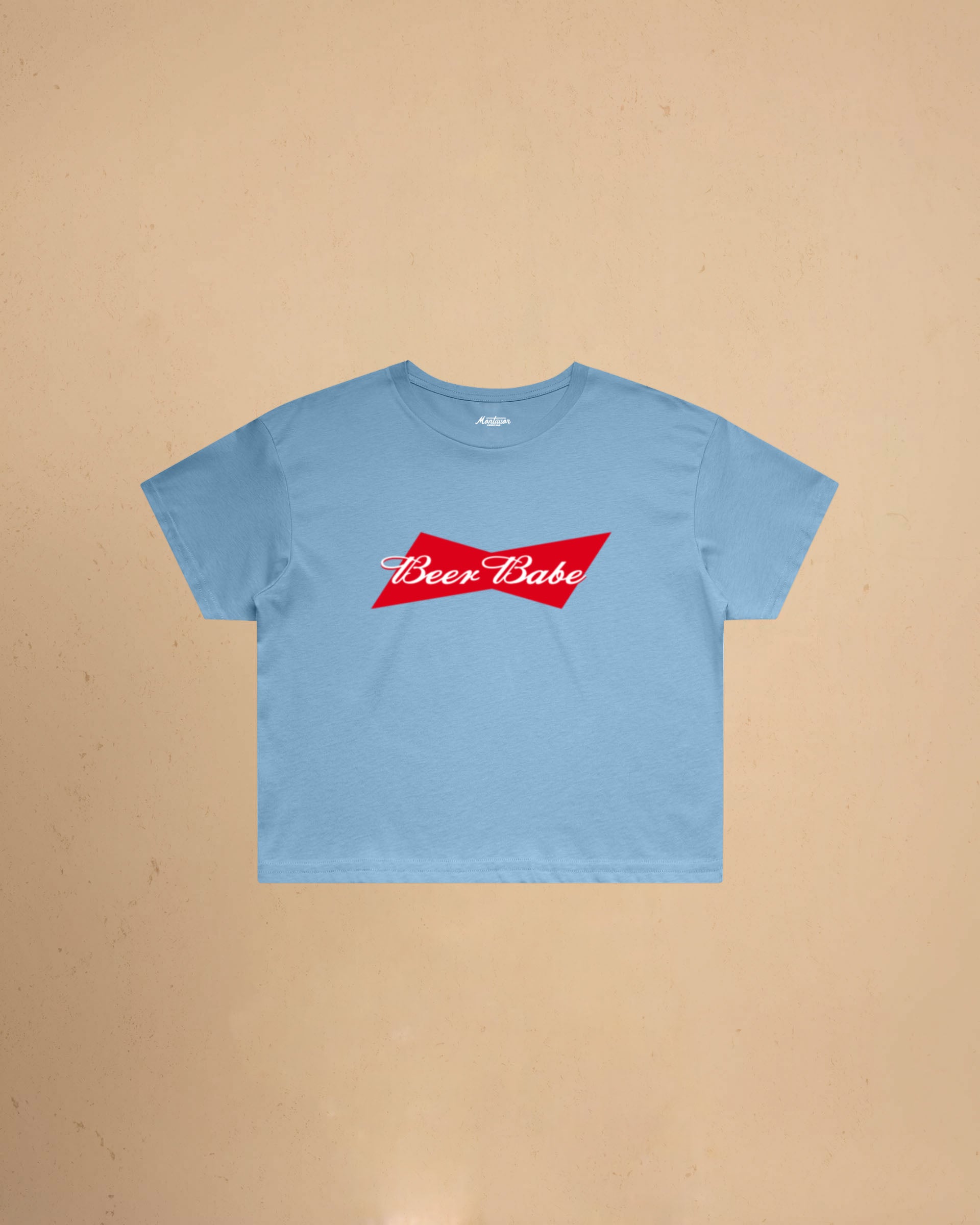 Women’s Beer Babe crop t-shirt featuring a bold beer-inspired graphic design on a relaxed-fit cropped cotton tee.