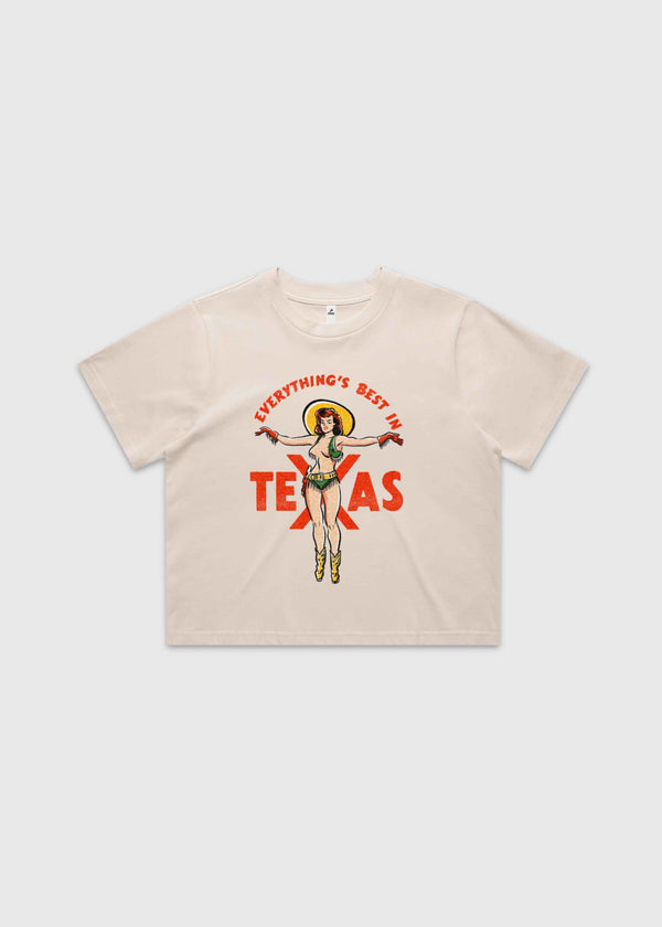 Bone cropped t-shirt featuring a retro cowgirl illustration with the text “Everything’s Best in Texas,” premium Western graphic tee by America Provisions.