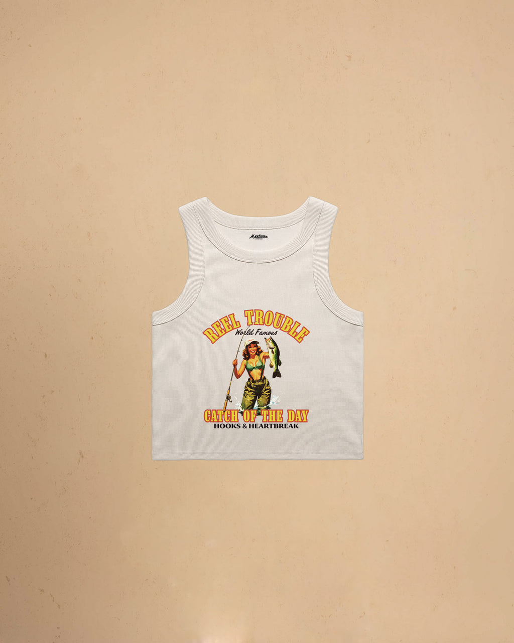 Women’s Reel Trouble organic crop tank featuring a vintage fishing pin-up graphic with retro western styling and heavyweight ribbed cotton construction.