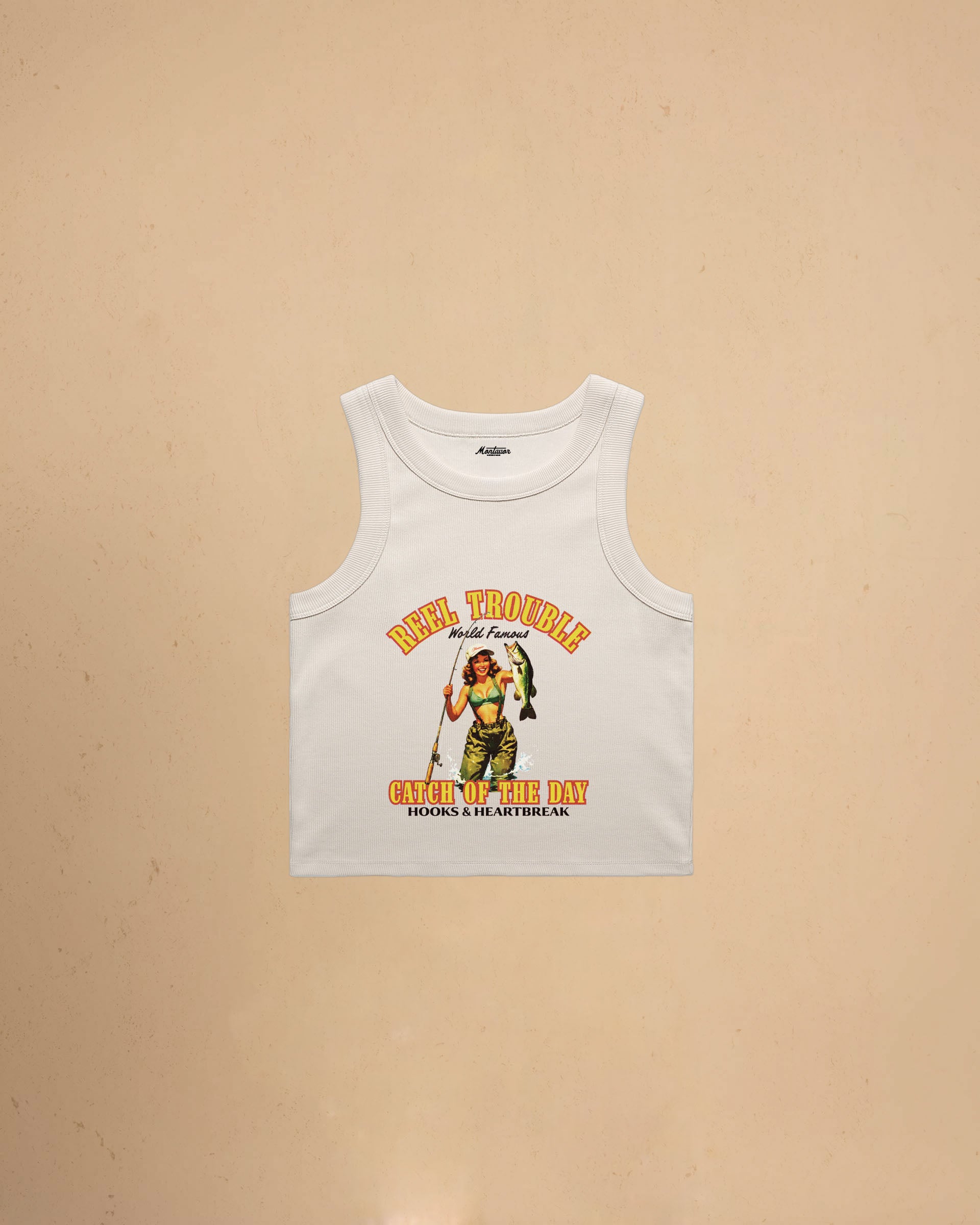 Women’s Reel Trouble organic crop tank featuring a vintage fishing pin-up graphic with retro western styling and heavyweight ribbed cotton construction.