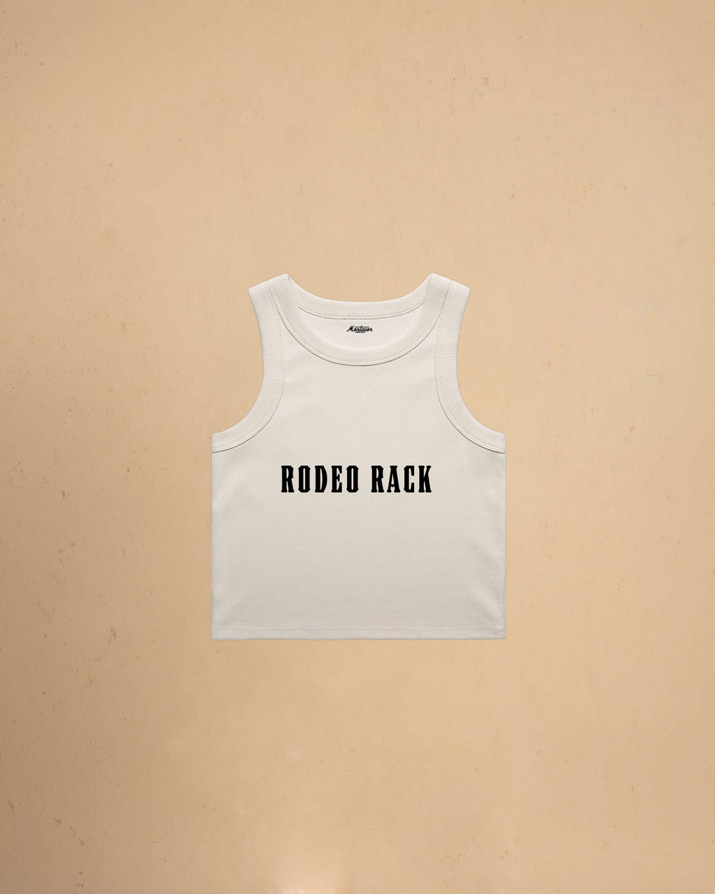 Rodeo Rack organic crop tank top by Montavor featuring bold western typography on a premium ribbed cropped tank.