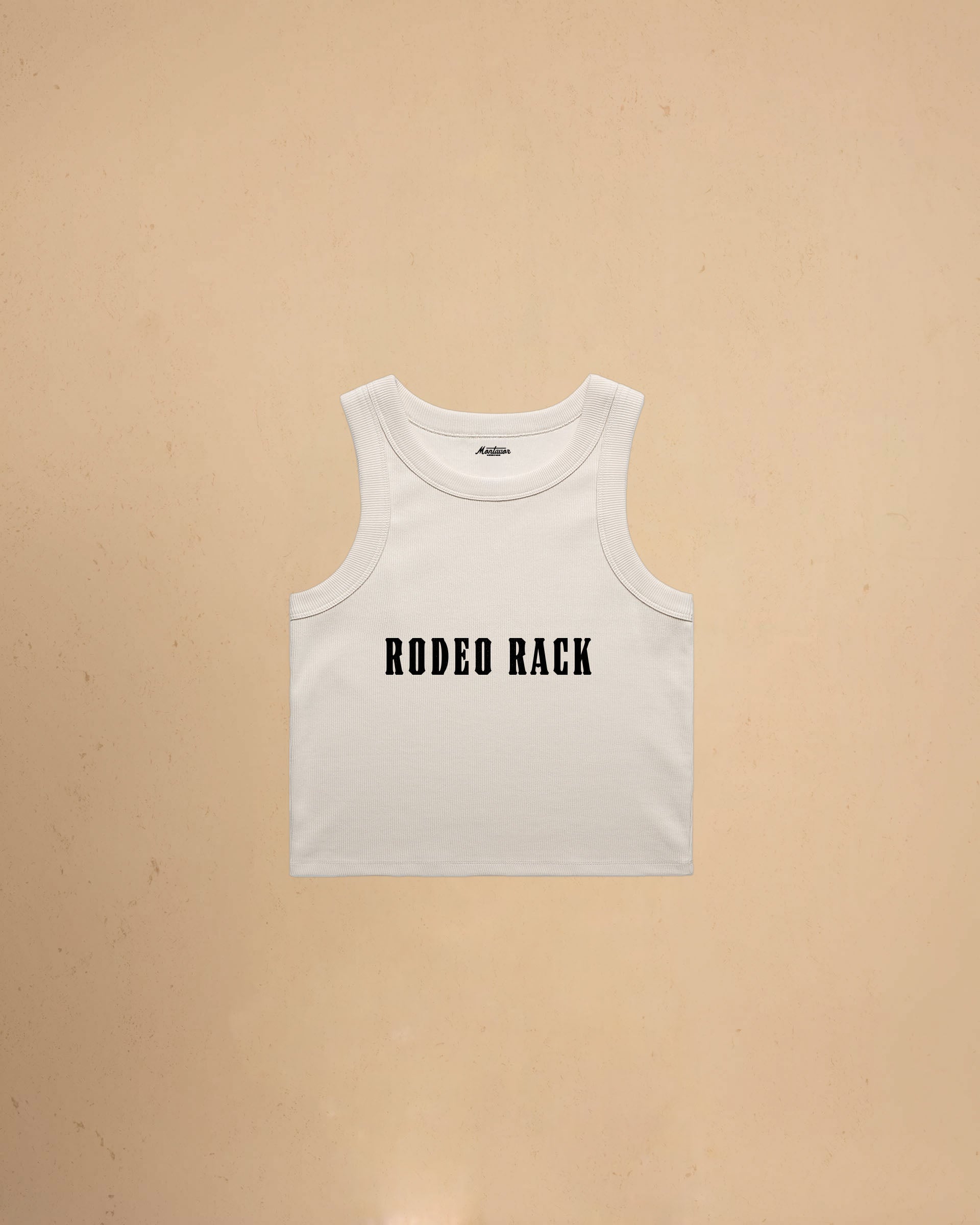 Rodeo Rack organic crop tank top by Montavor featuring bold western typography on a premium ribbed cropped tank.