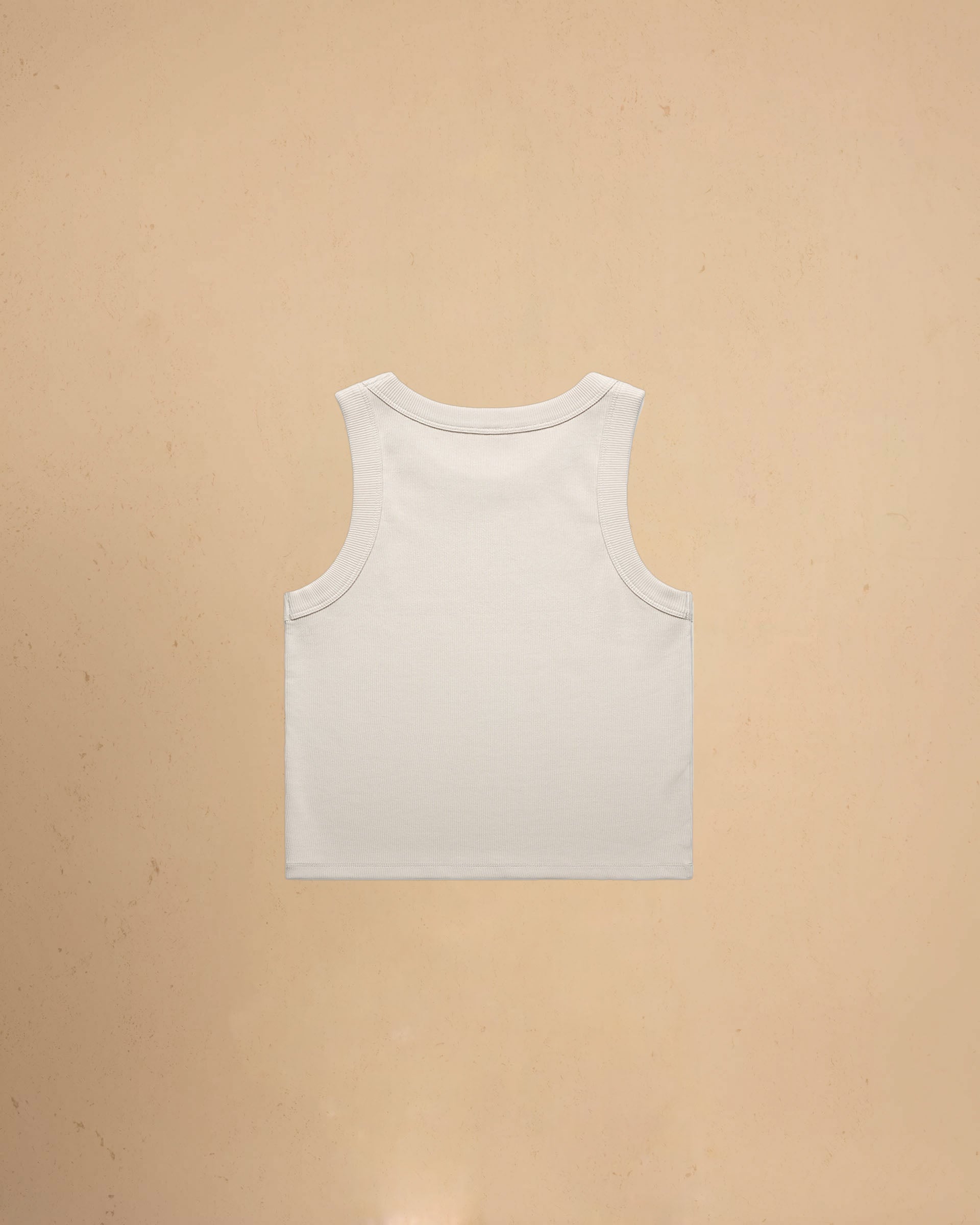 Bone tank top on a beige background