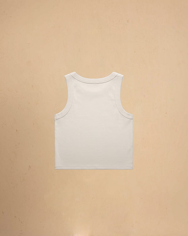 Bone tank top on a beige background
