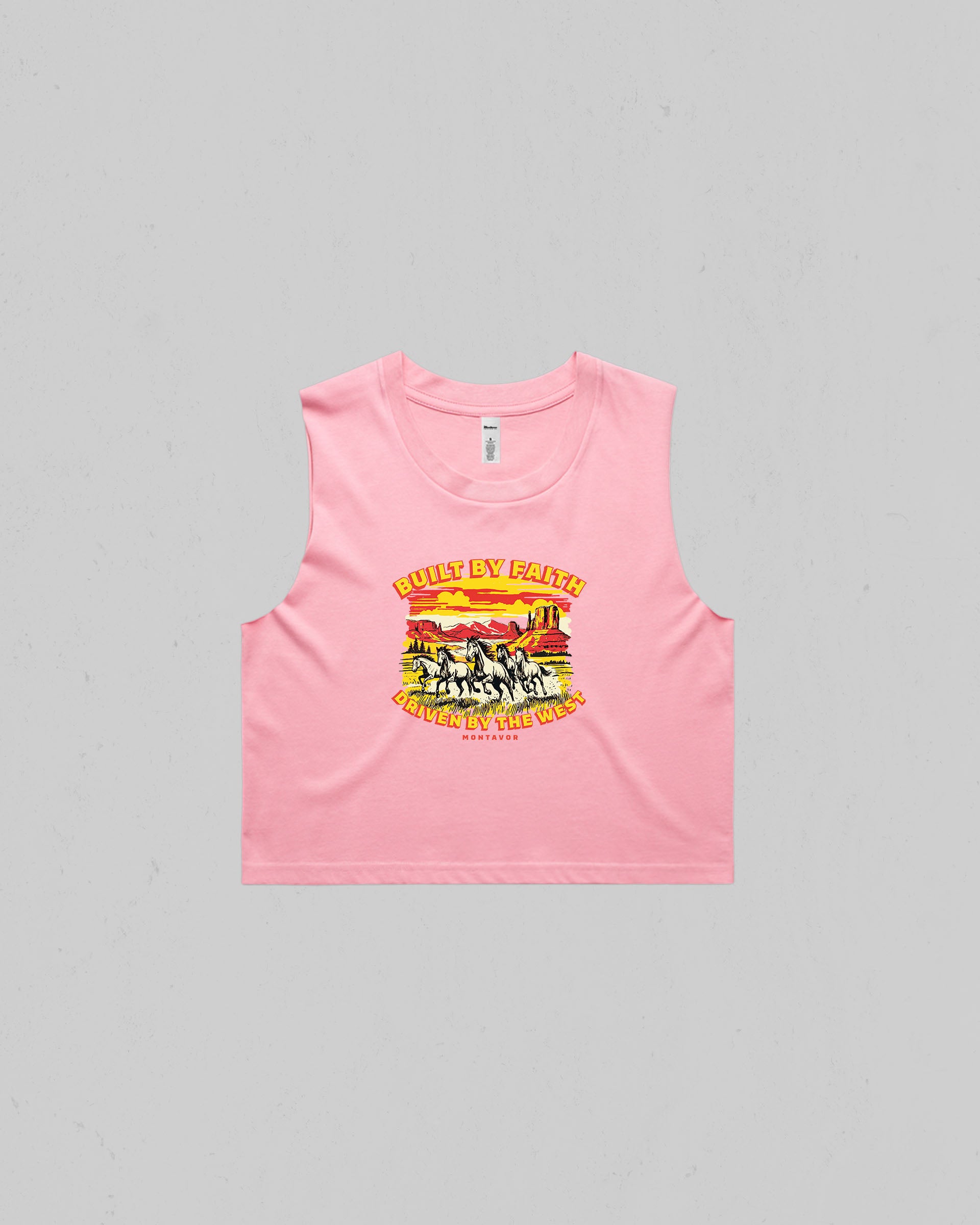 Pink Women’s “Built By Faith, Driven By The West” crop tank top featuring a vintage western horse and desert graphic by Montavor.