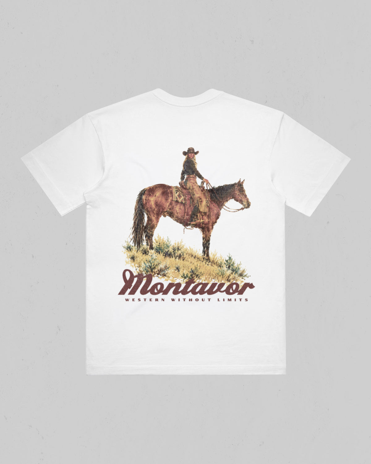 Montavor women’s Cowgirl T-shirt, back view featuring a cowgirl on horseback above the Montavor logo and Western Without Limits slogan. Main image