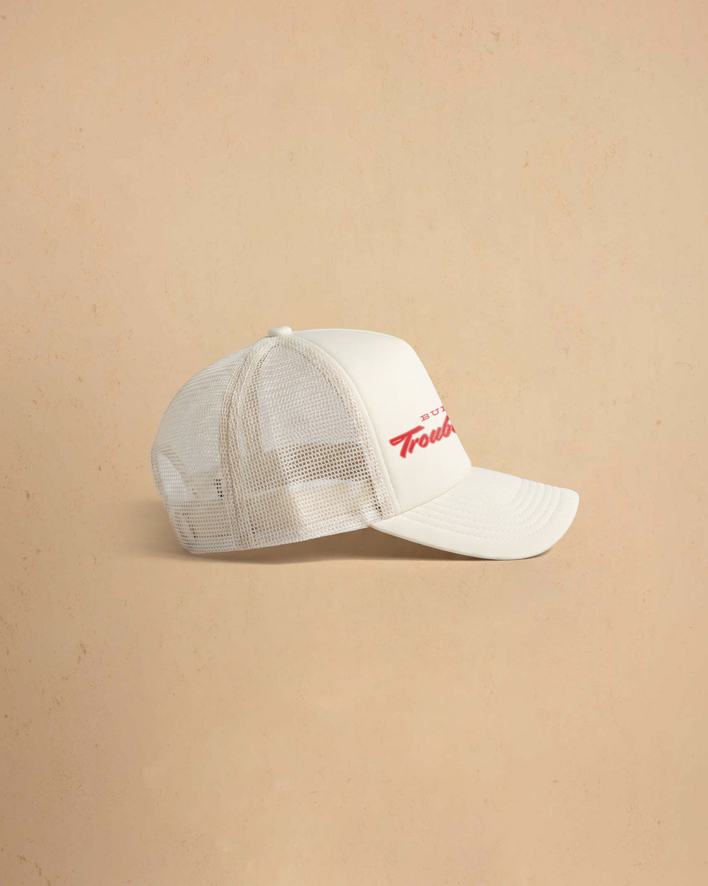 Built For Trouble trucker cap featuring a bold Western-inspired graphic on a high-profile foam-front snapback cap with breathable mesh backing.