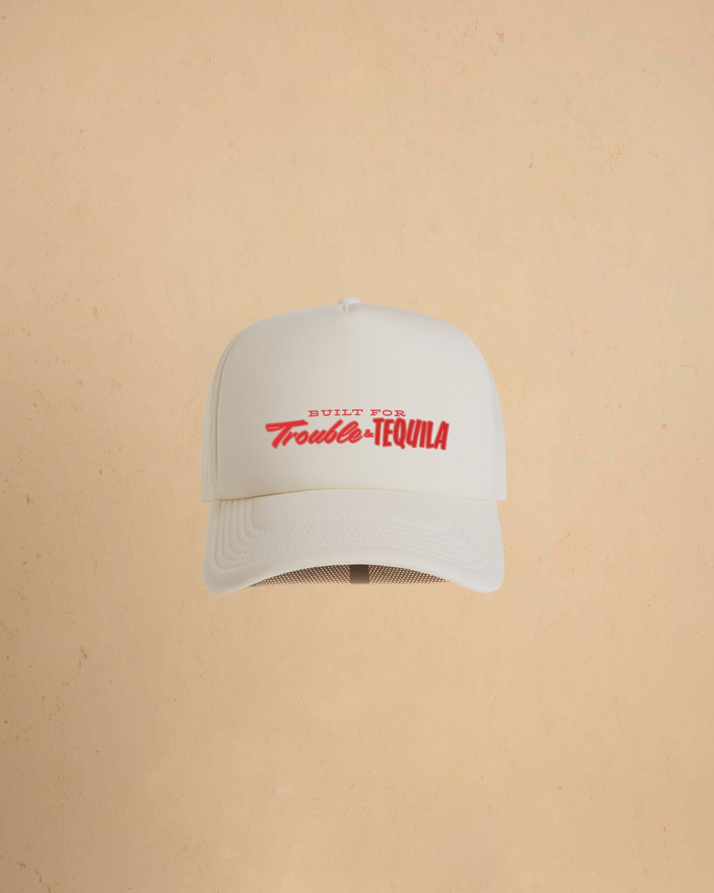 Built For Trouble trucker cap featuring a bold Western-inspired graphic on a high-profile foam-front snapback cap with breathable mesh backing.