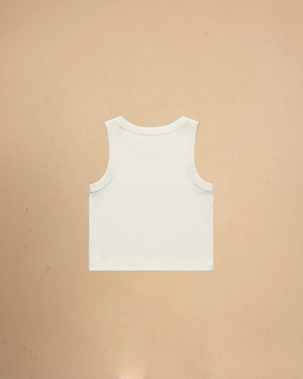Ecru tank top on a beige background