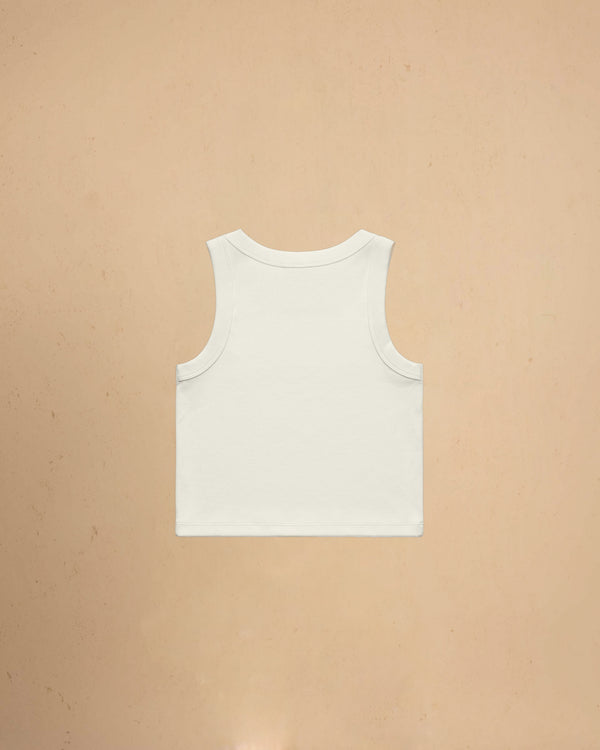 Ecru tank top on a beige background