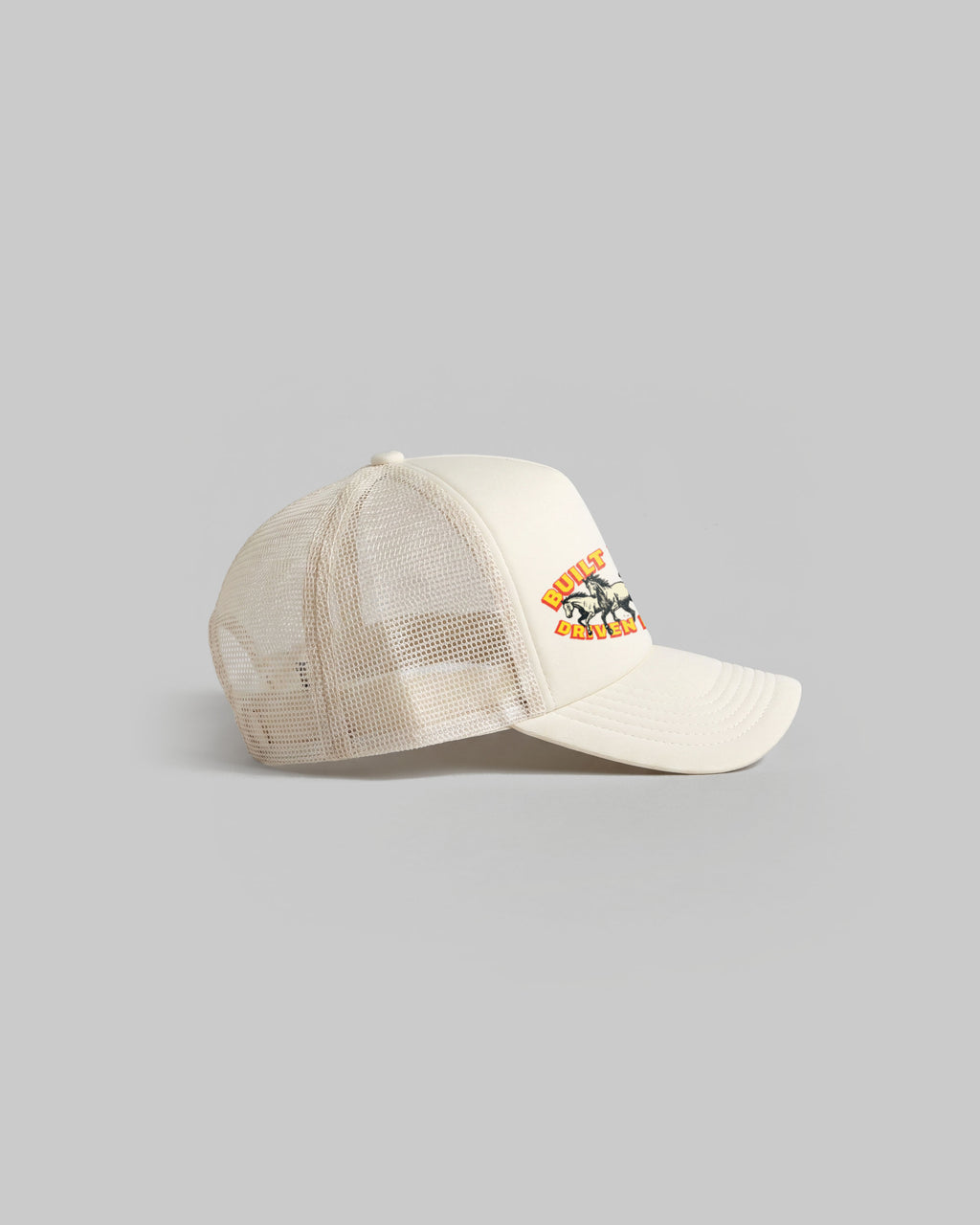 Ecru trucker cap with curved peak.