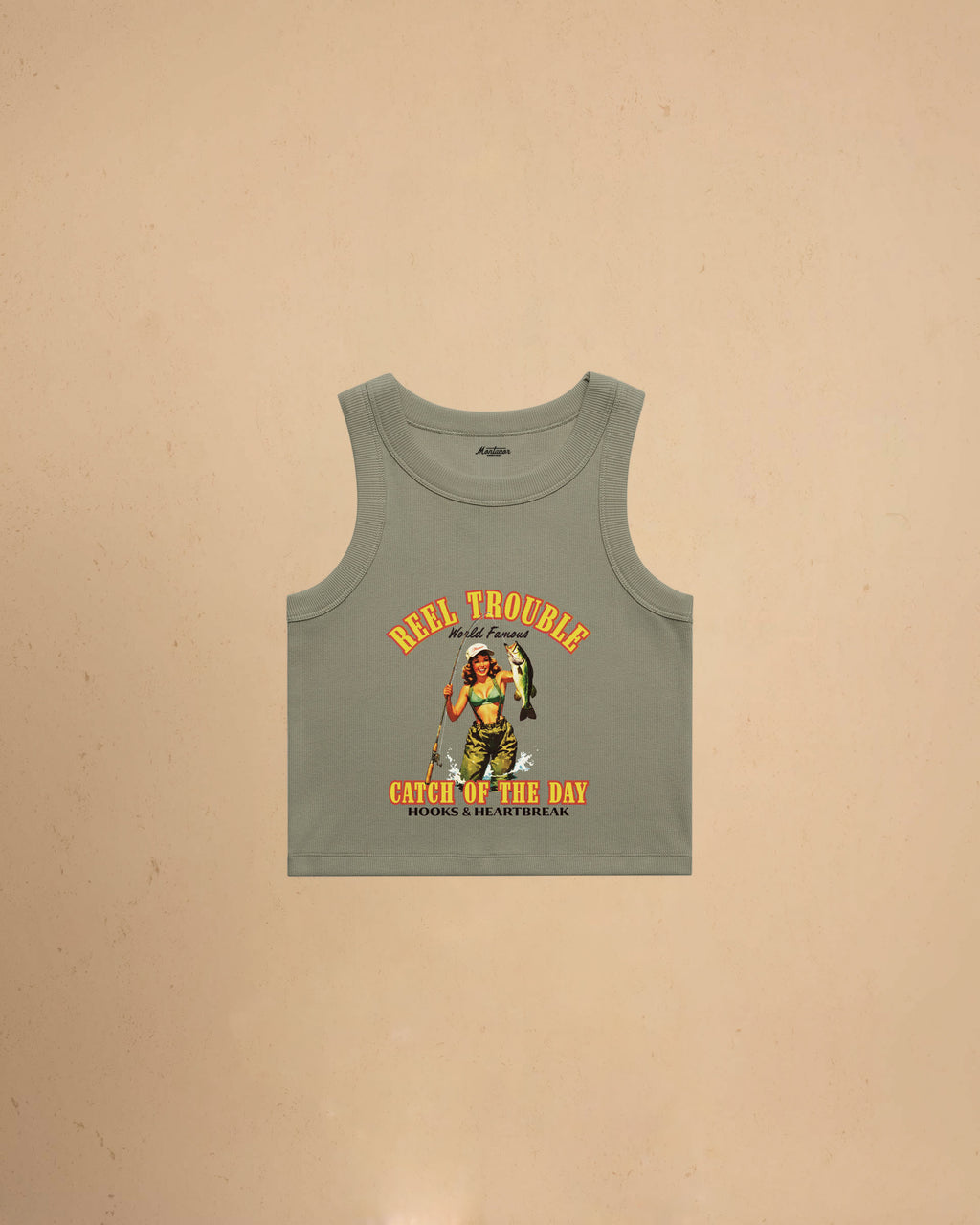 Women’s Reel Trouble organic crop tank featuring a vintage fishing pin-up graphic with retro western styling and heavyweight ribbed cotton construction.