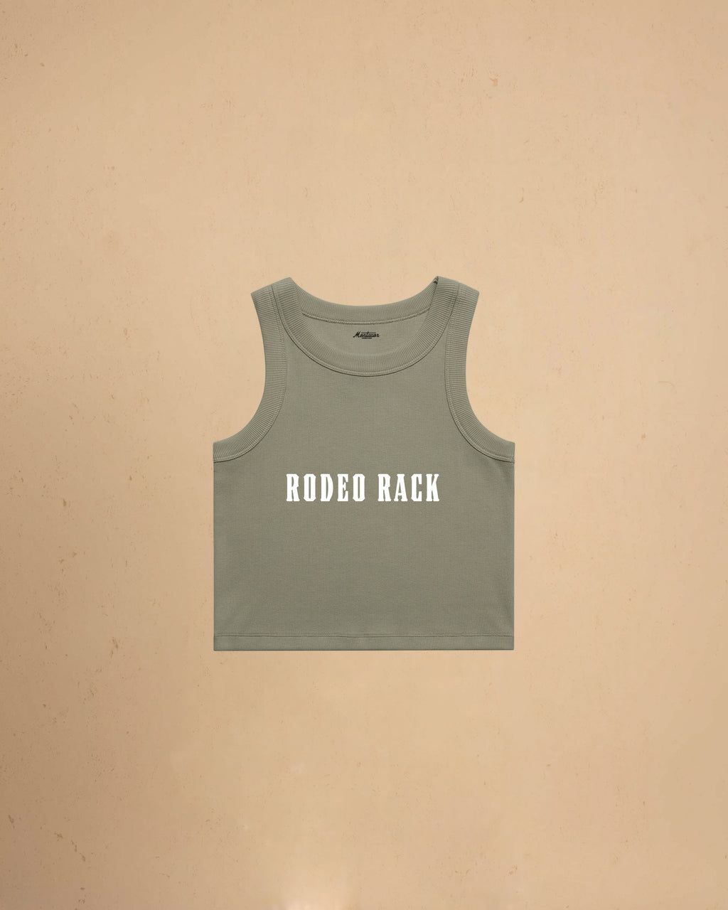 Rodeo Rack organic crop tank top by Montavor featuring bold western typography on a premium ribbed cropped tank.