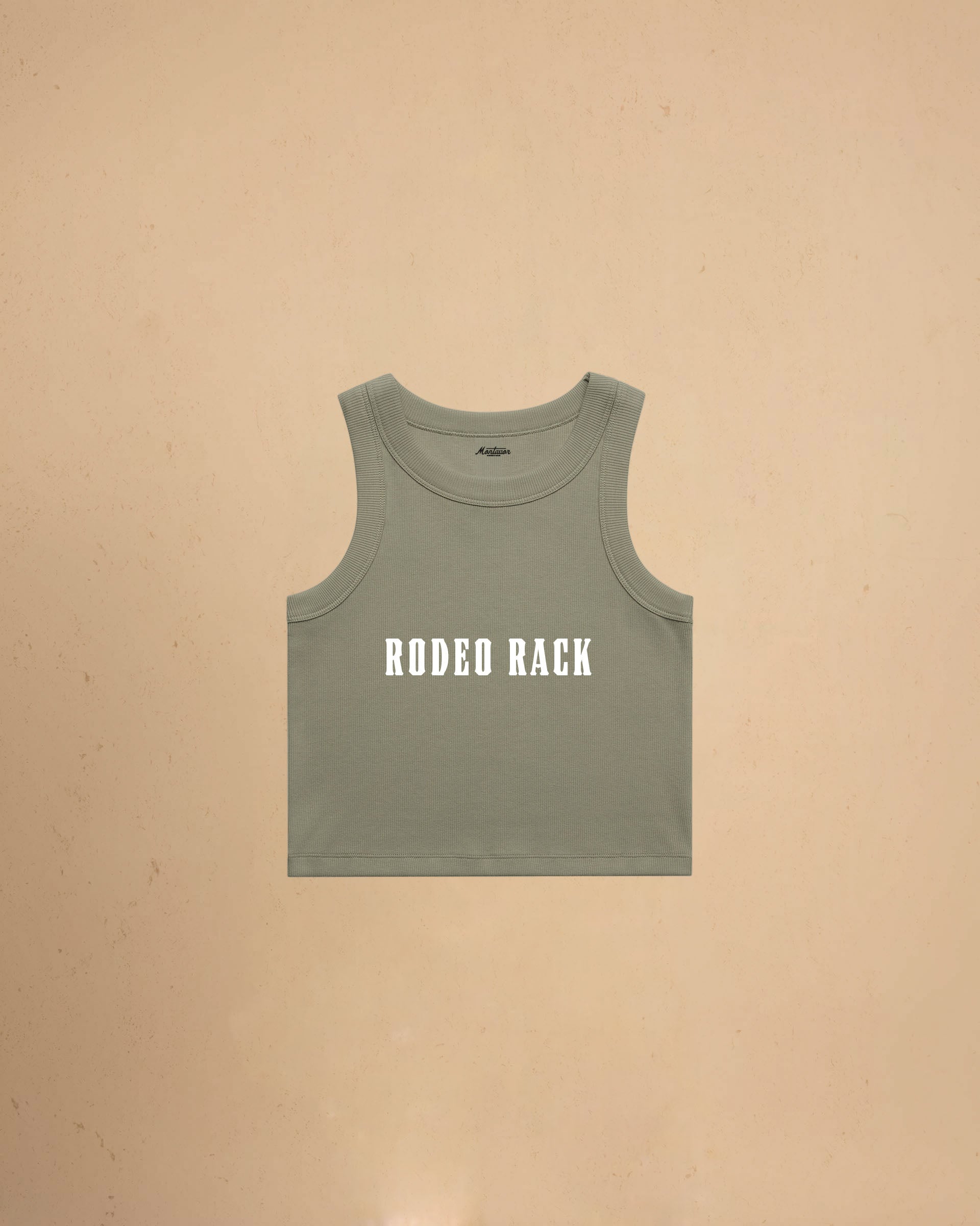 Rodeo Rack organic crop tank top by Montavor featuring bold western typography on a premium ribbed cropped tank.