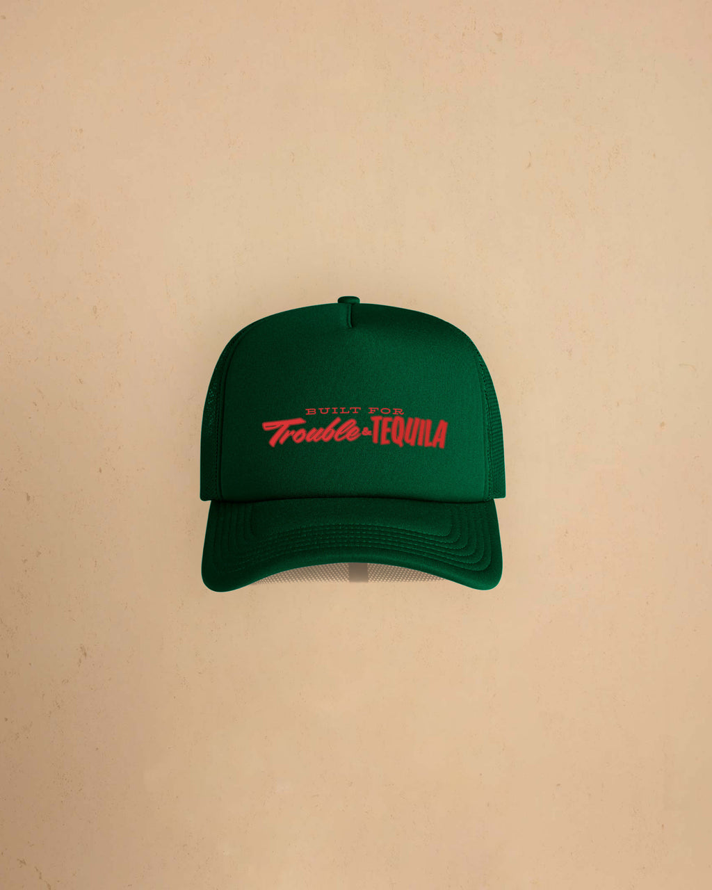 Built For Trouble trucker cap featuring a bold Western-inspired graphic on a high-profile foam-front snapback cap with breathable mesh backing.
