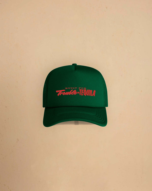 Built For Trouble trucker cap featuring a bold Western-inspired graphic on a high-profile foam-front snapback cap with breathable mesh backing.
