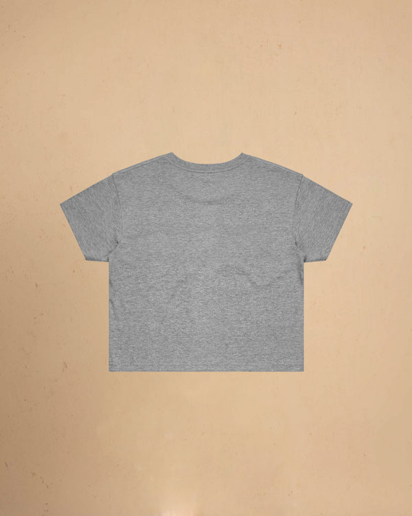 Gray t-shirt on a beige background