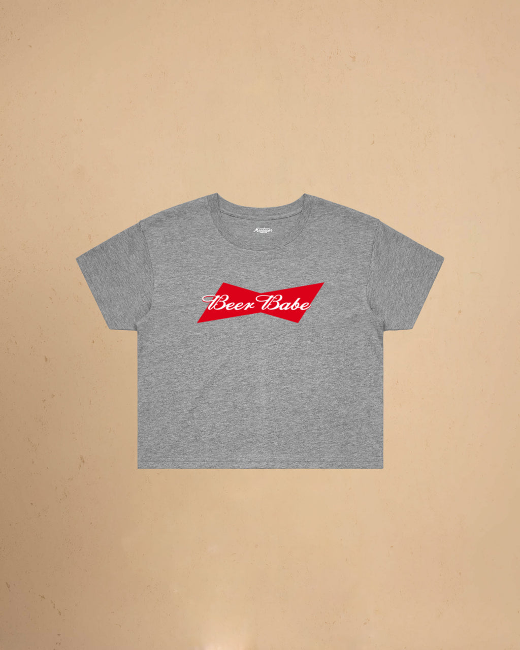 Women’s Beer Babe crop t-shirt featuring a bold beer-inspired graphic design on a relaxed-fit cropped cotton tee.