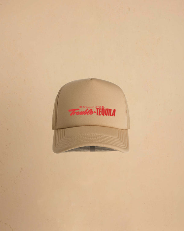 Built For Trouble trucker cap featuring a bold Western-inspired graphic on a high-profile foam-front snapback cap with breathable mesh backing.