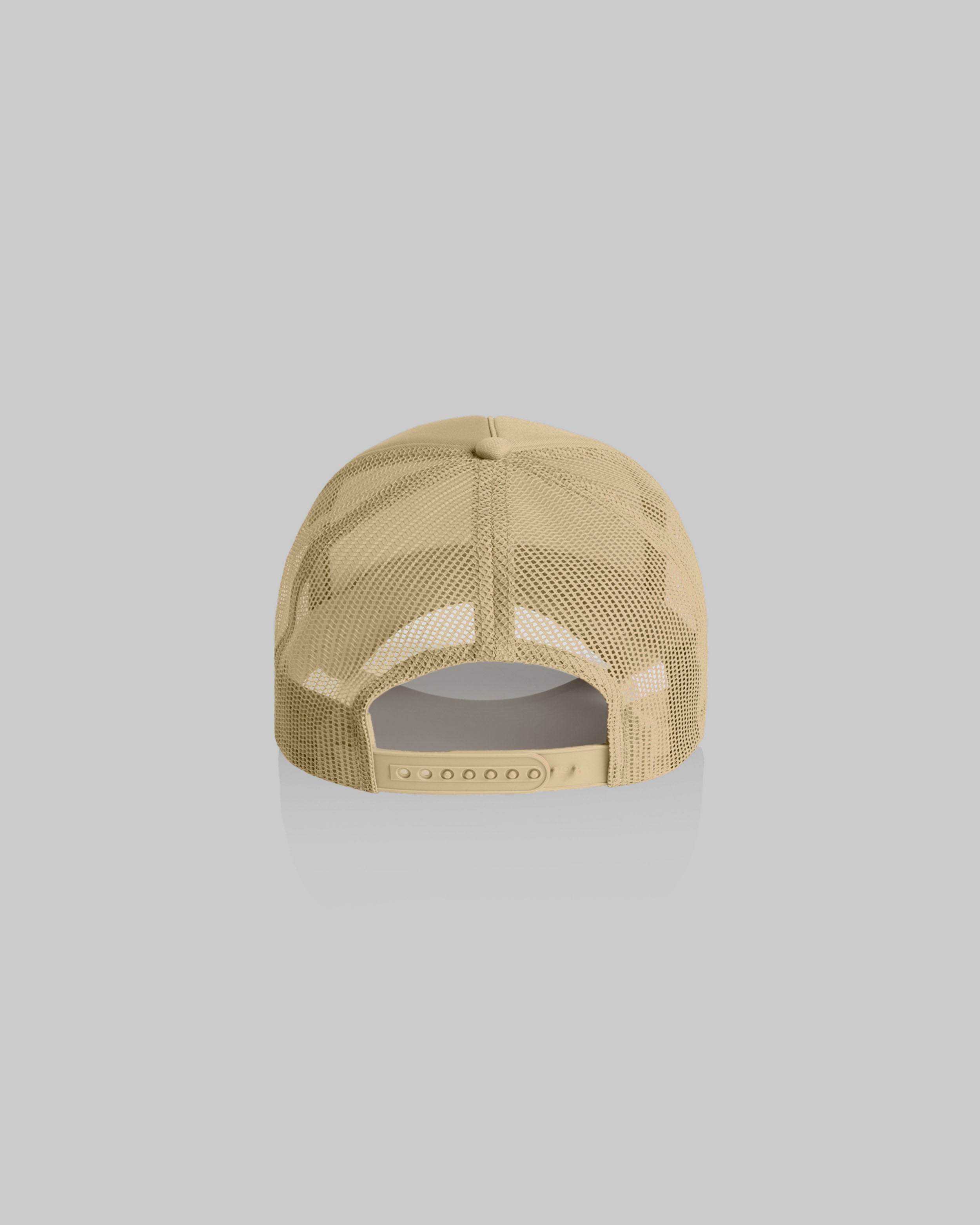 A tan trucker-style baseball cap viewed from the back, featuring a mesh back and an adjustable snap closure, set against a solid gray background.