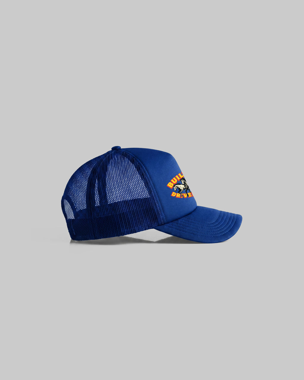 Blue trucker cap with curved peak.