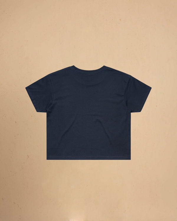 Navy blue t-shirt on a beige background