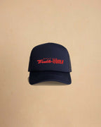 Built For Trouble trucker cap featuring a bold Western-inspired graphic on a high-profile foam-front snapback cap with breathable mesh backing.