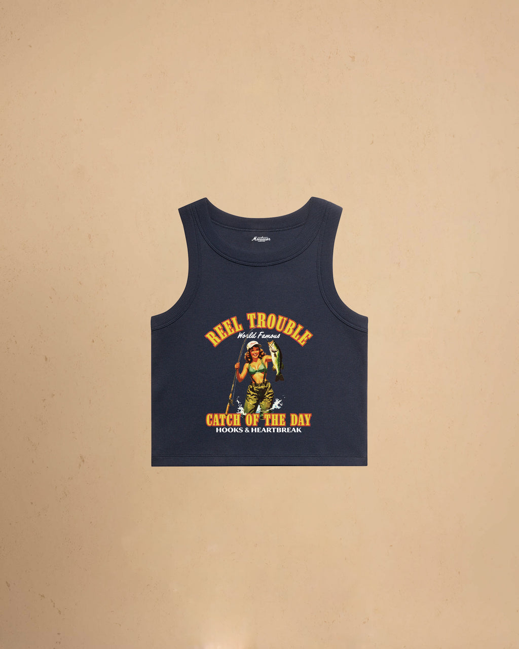 Women’s Reel Trouble organic crop tank featuring a vintage fishing pin-up graphic with retro western styling and heavyweight ribbed cotton construction.