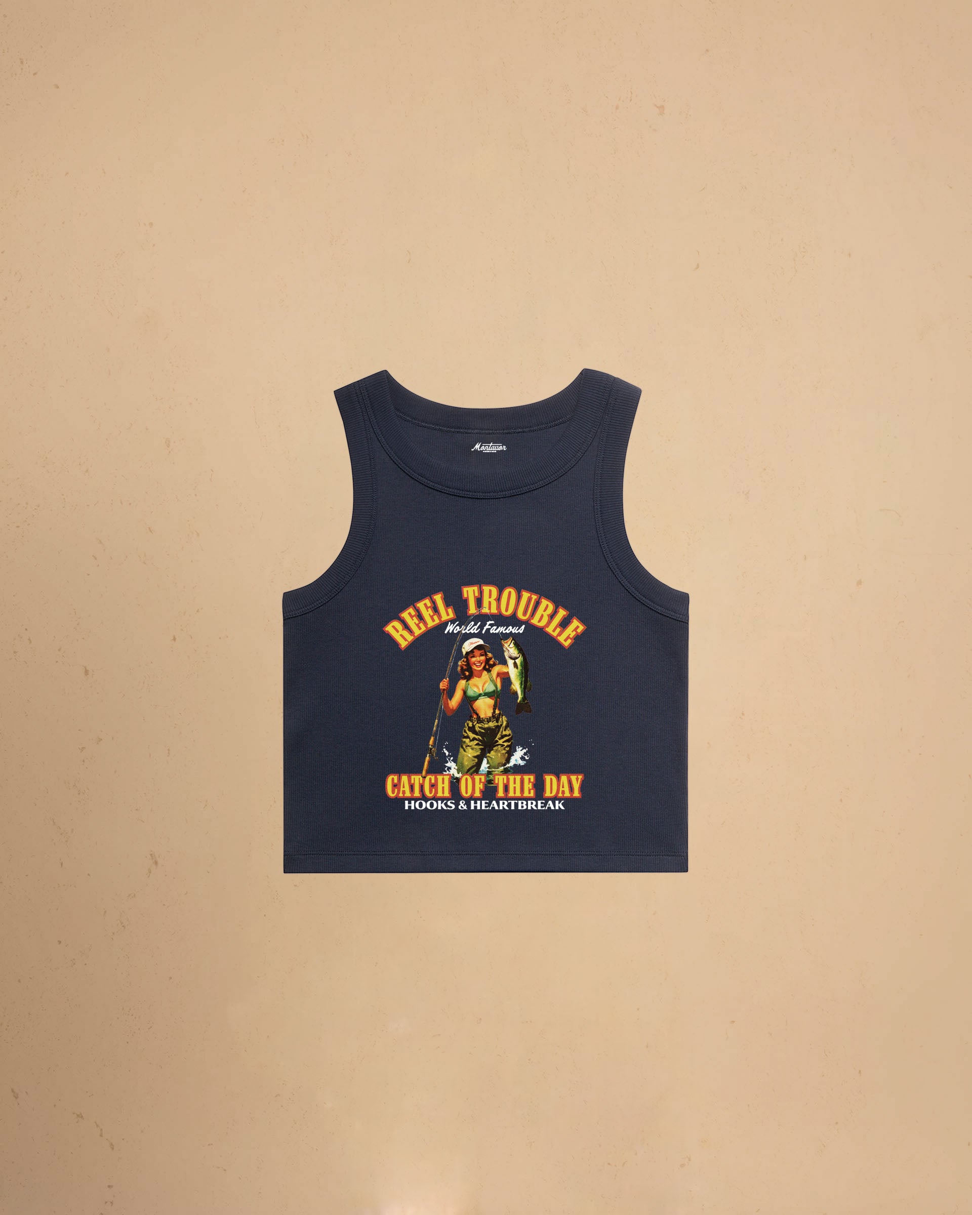 Women’s Reel Trouble organic crop tank featuring a vintage fishing pin-up graphic with retro western styling and heavyweight ribbed cotton construction.