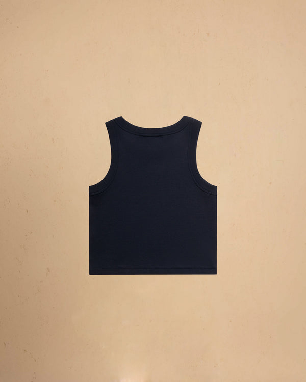 Navy tank top on a beige background
