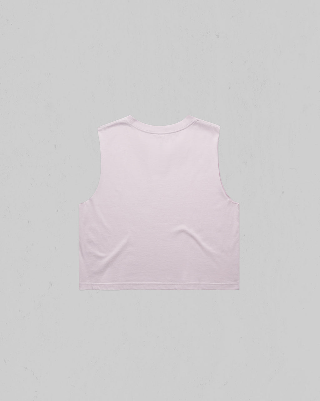 A light pink sleeveless crop top shown from the back, laid flat against a neutral light gray background.
