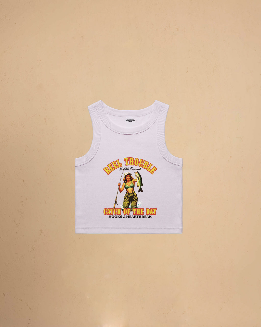 Women’s Reel Trouble organic crop tank featuring a vintage fishing pin-up graphic with retro western styling and heavyweight ribbed cotton construction.