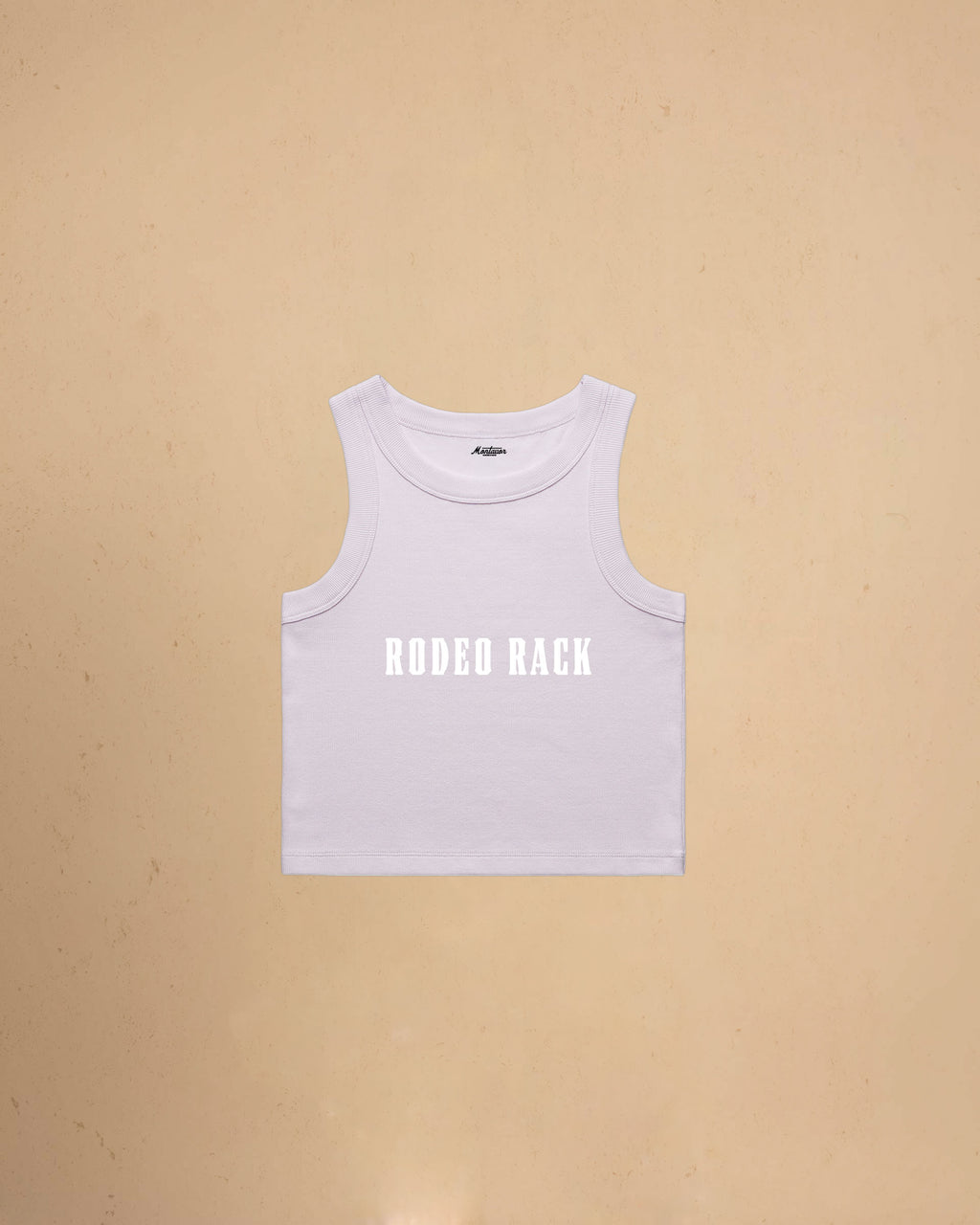 Rodeo Rack organic crop tank top by Montavor featuring bold western typography on a premium ribbed cropped tank.