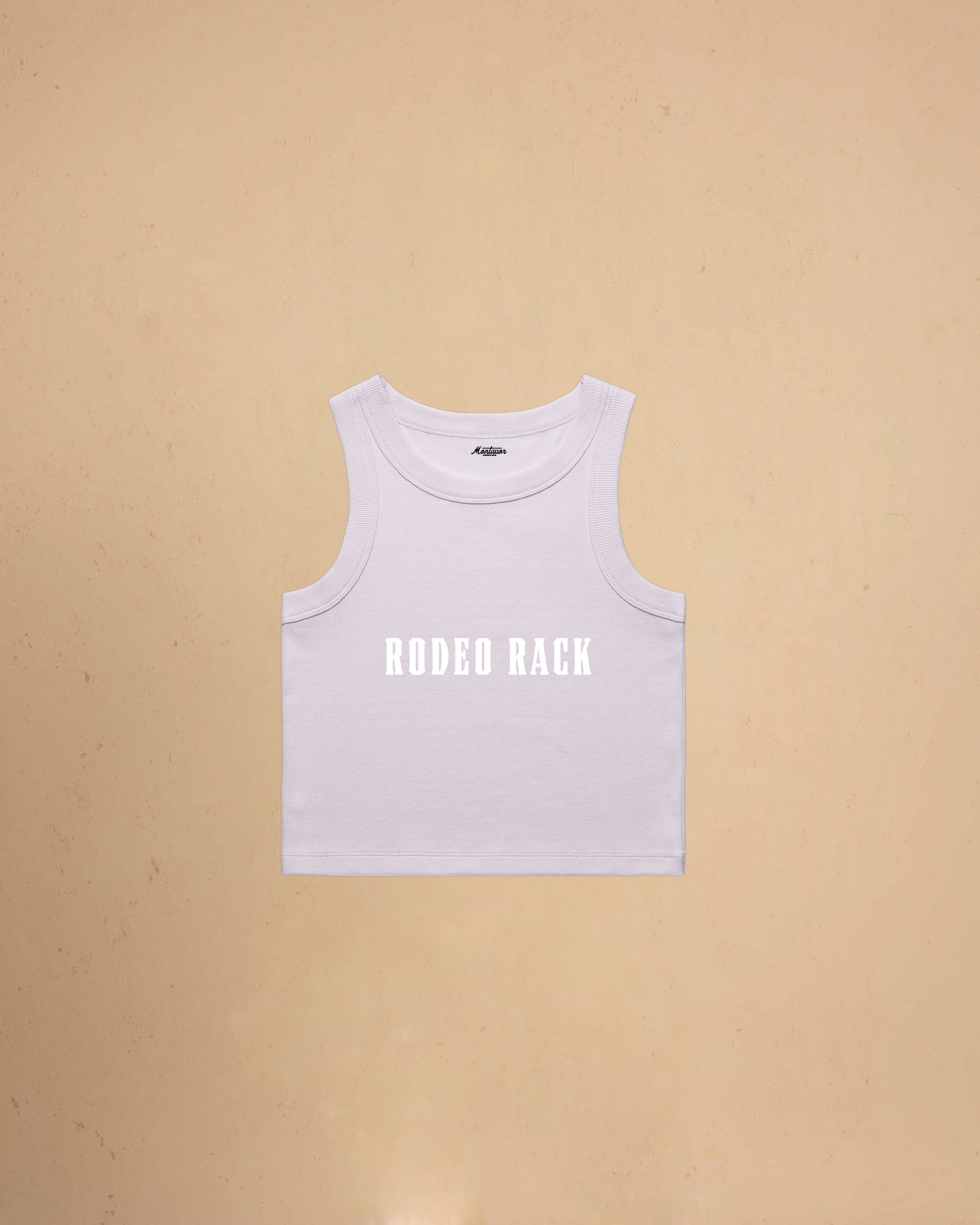 Rodeo Rack organic crop tank top by Montavor featuring bold western typography on a premium ribbed cropped tank.