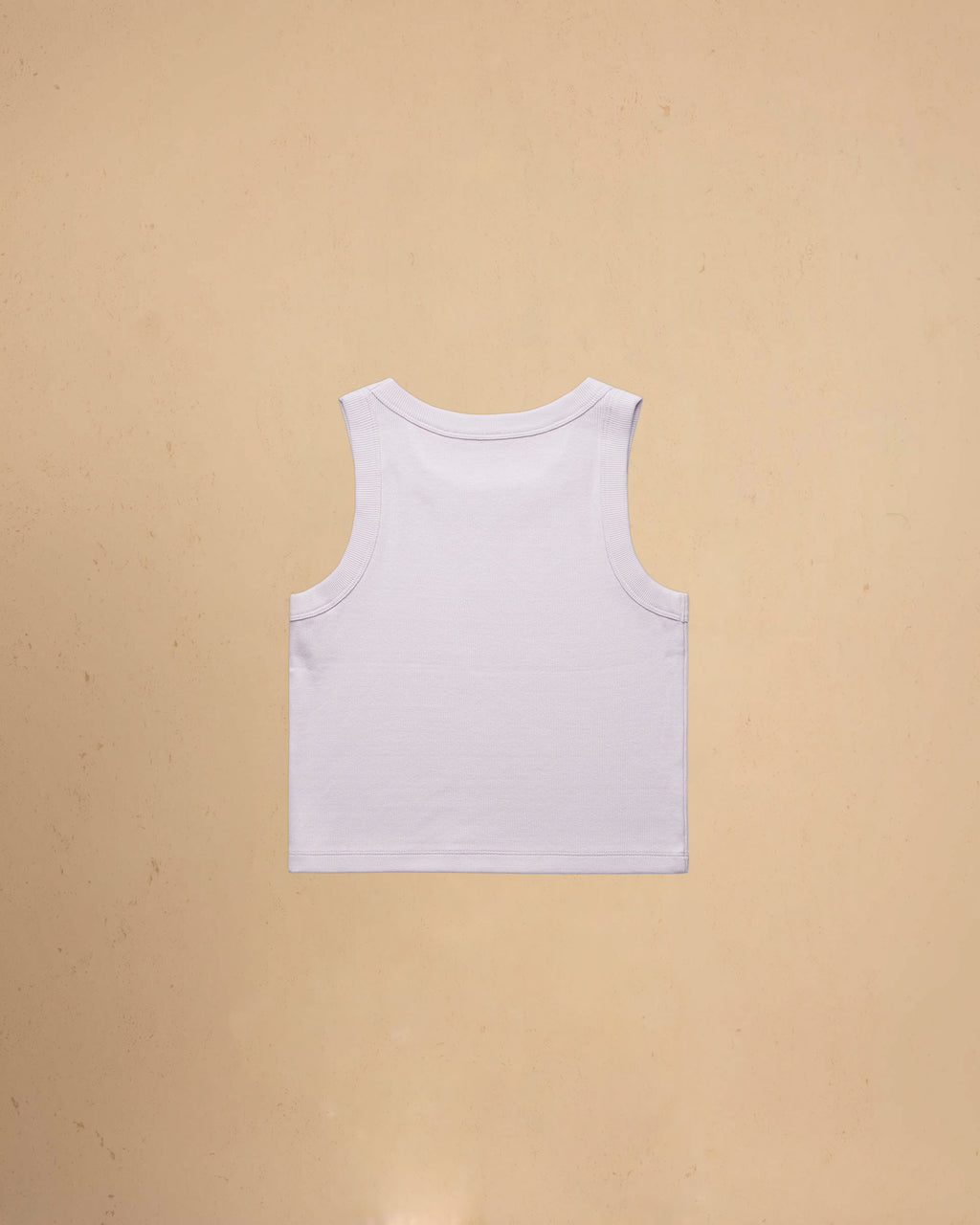 Orchid tank top on a beige background