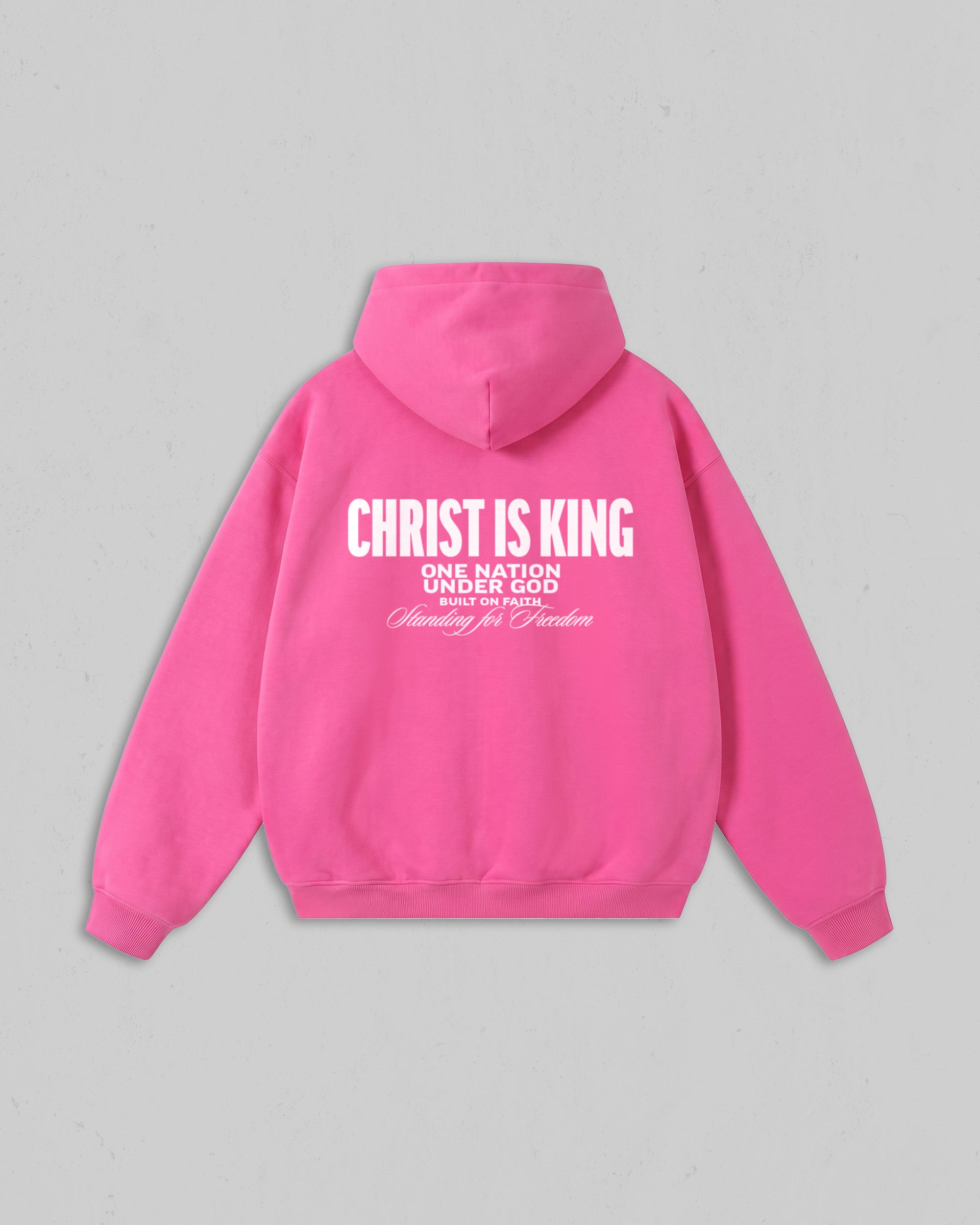 Back view of women’s Pink Christ Is King hoodie with bold white Christian 