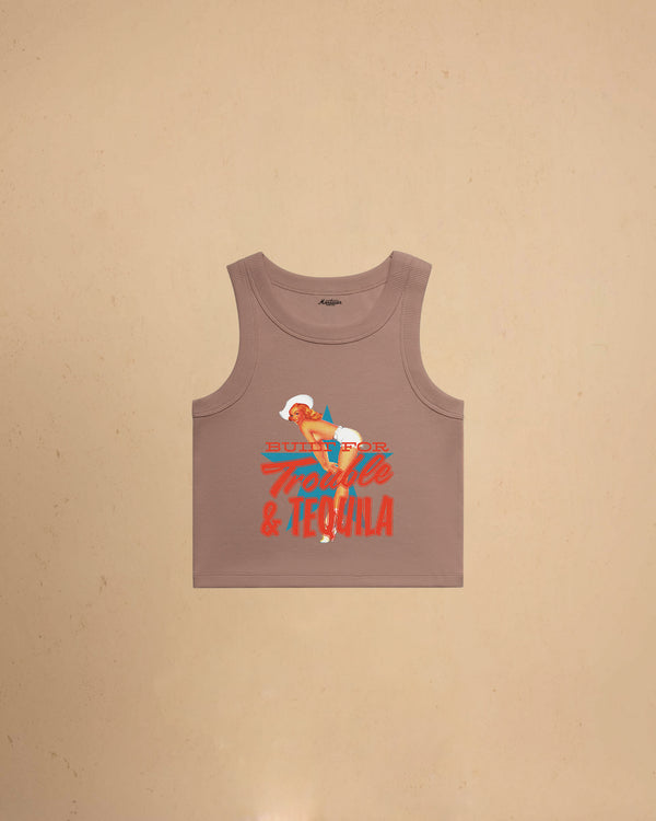 Hazy Pink Women’s Built For Trouble cropped tank top featuring a vintage-inspired Western graphic print on a premium ribbed crop tank.