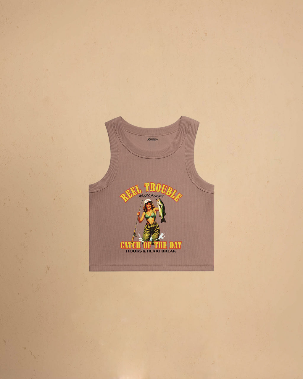 Women’s Reel Trouble organic crop tank featuring a vintage fishing pin-up graphic with retro western styling and heavyweight ribbed cotton construction.