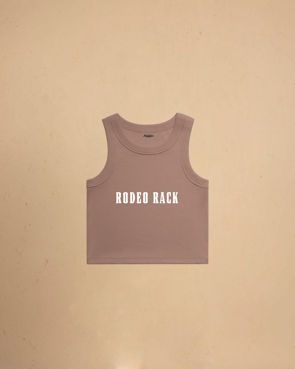 Rodeo Rack organic crop tank top by Montavor featuring bold western typography on a premium ribbed cropped tank.
