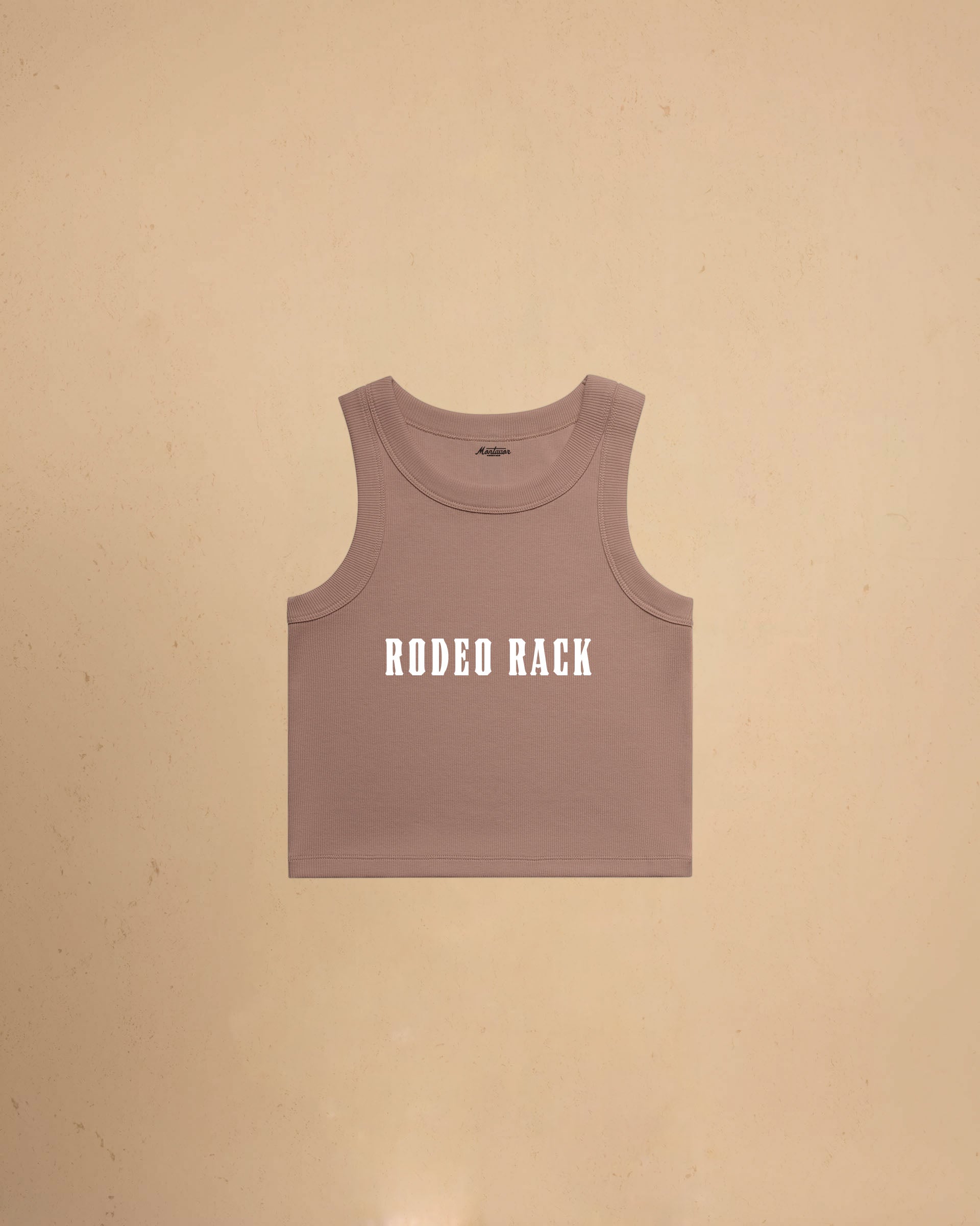 Rodeo Rack organic crop tank top by Montavor featuring bold western typography on a premium ribbed cropped tank.