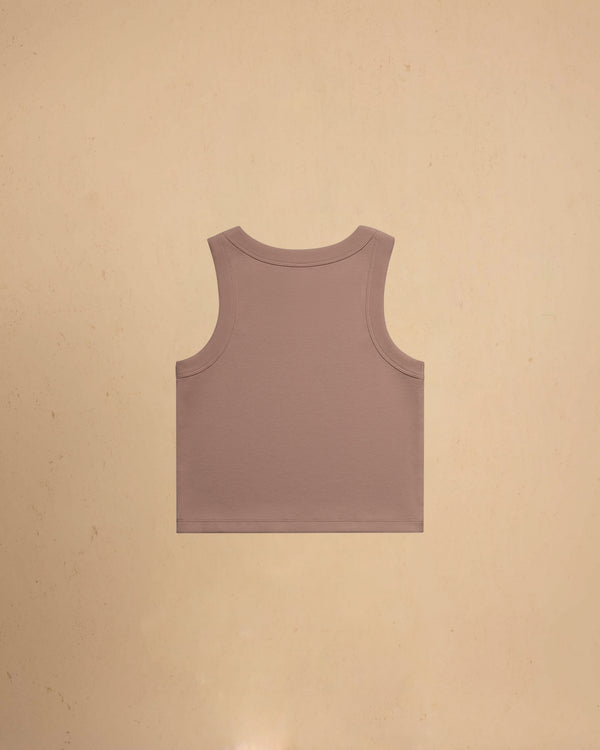 Hazy Pink tank top on a beige background