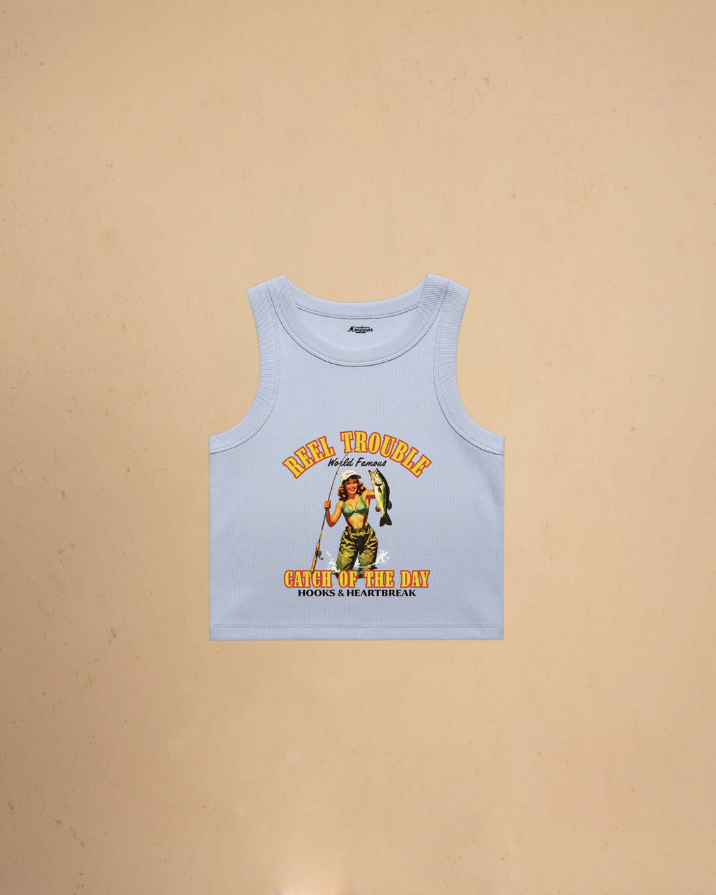 Women’s Reel Trouble organic crop tank featuring a vintage fishing pin-up graphic with retro western styling and heavyweight ribbed cotton construction.