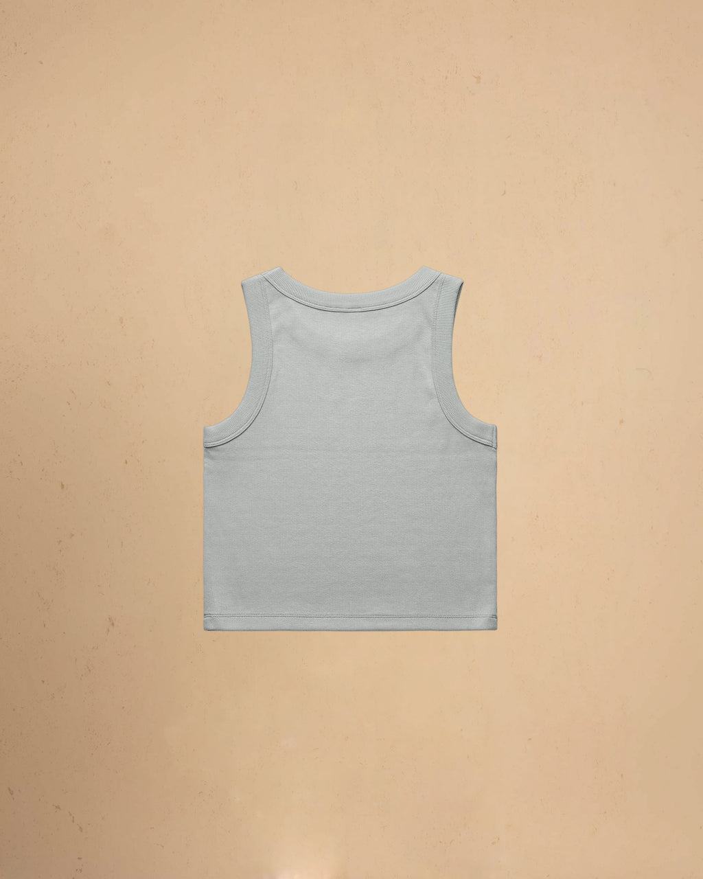 Storm blue tank top on a beige background